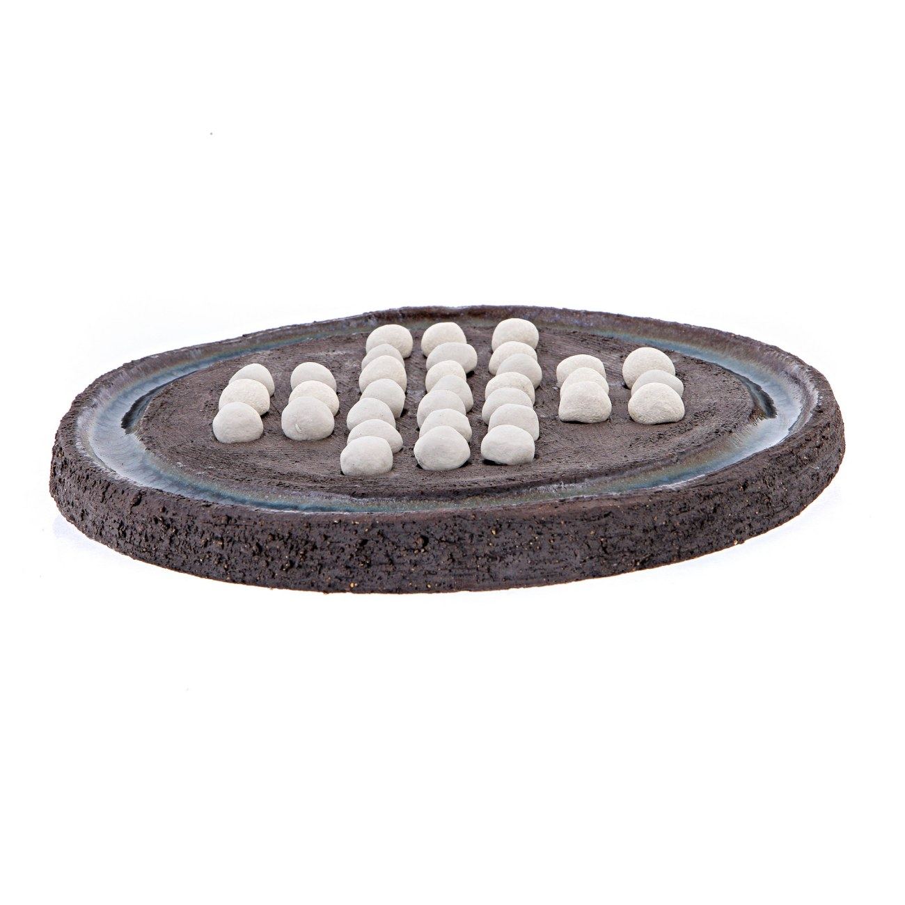 Board game with black and white marbles top
